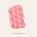 Brosse d'angle de massage rose pour chat