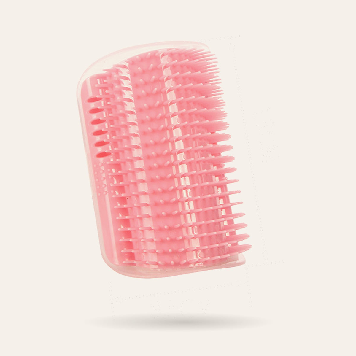 Brosse d'angle de massage rose pour chat